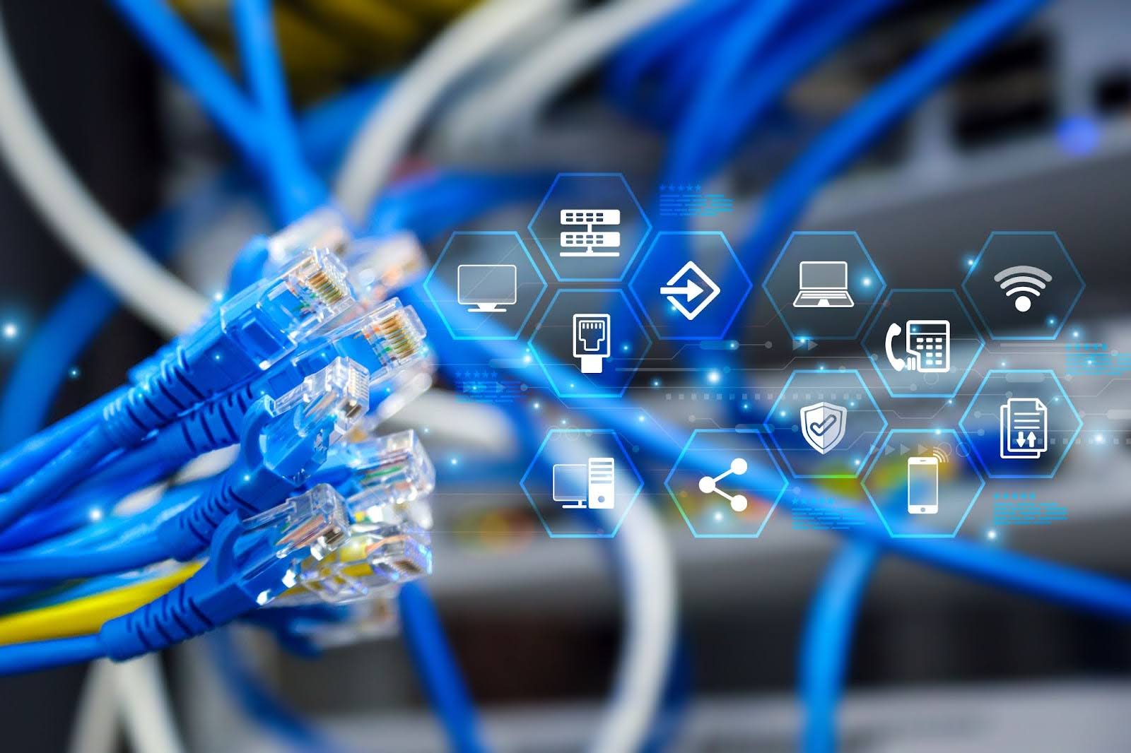 several blue cables with icons of computers, phones, and other devices coming out of them